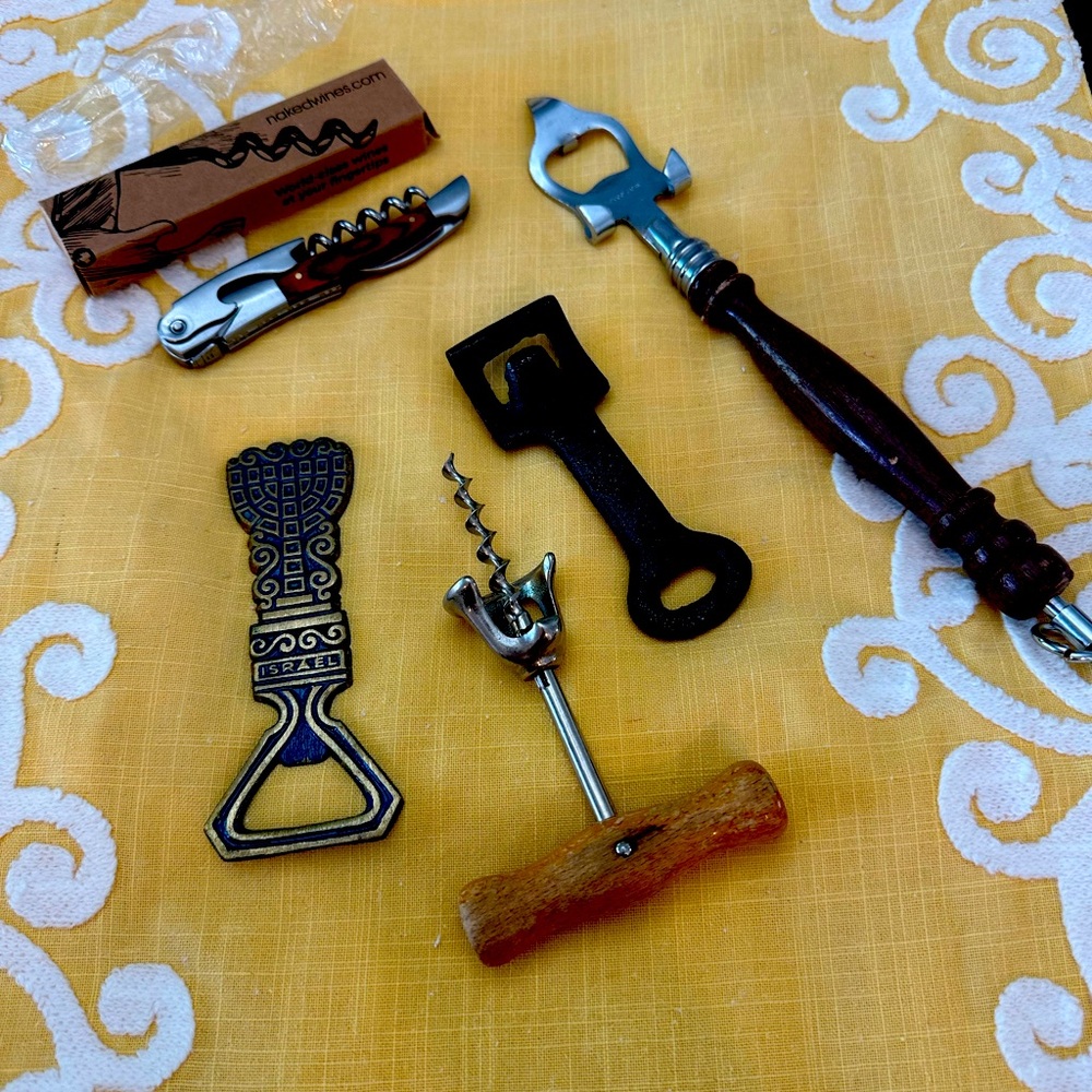 This  lot of bottle/wine openers is vintage with the exception of one opener.